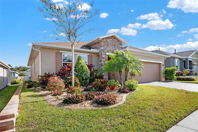 ranch-style house with a garage and a front lawn