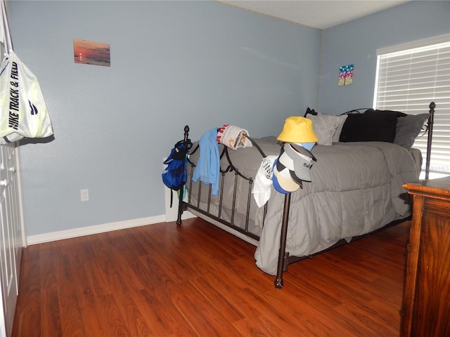 bedroom featuring hardwood / wood-style floors