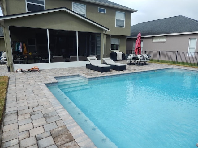 view of pool featuring a patio