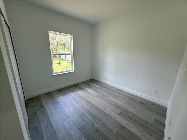 unfurnished room with light hardwood / wood-style floors