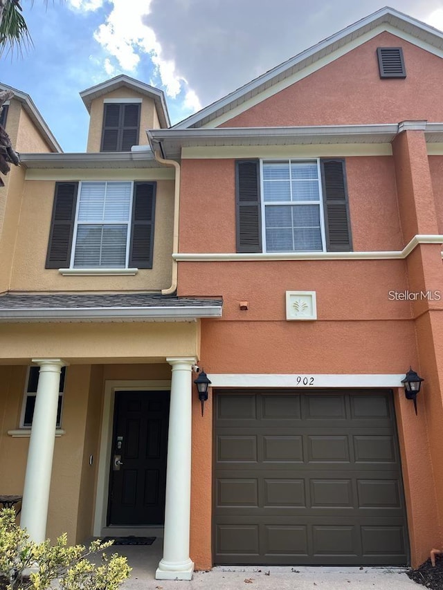 view of front of property with a garage