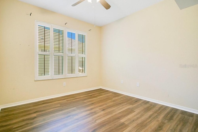 unfurnished room featuring wood-type flooring and ceiling fan