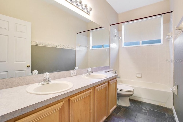 full bathroom featuring vanity, toilet, and bathtub / shower combination