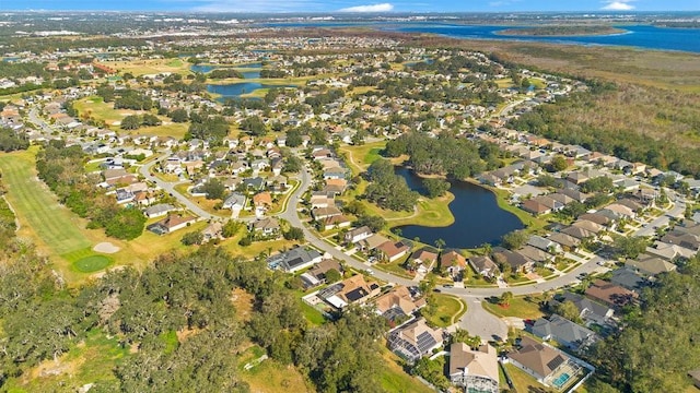 bird's eye view with a water view