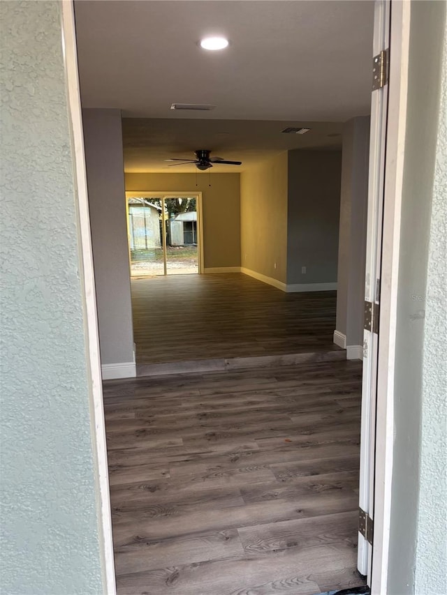 corridor featuring hardwood / wood-style flooring