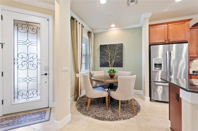 dining room featuring ornamental molding, recessed lighting, visible vents, and baseboards