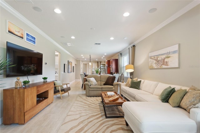 living area with light wood-style floors, visible vents, crown molding, and recessed lighting