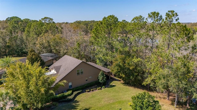 bird's eye view featuring a view of trees