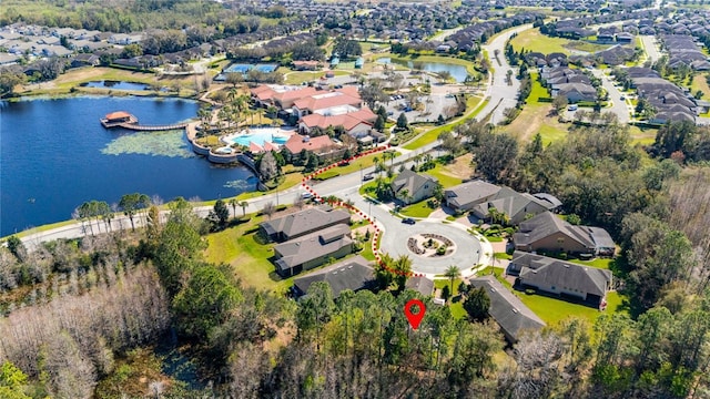 513 San Sebastian Ct, Davenport, FL 33837 - aerial overview of property's location featuring nearby suburban area and a large body of water