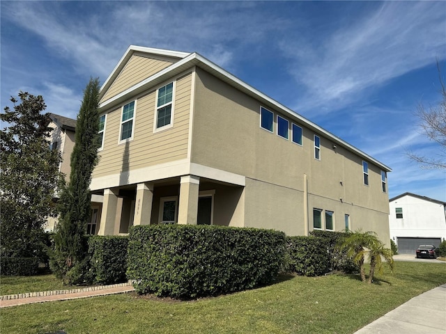 view of home's exterior with a yard