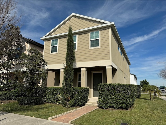 view of front of home with a front lawn