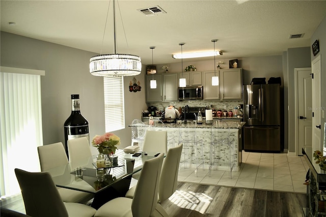 dining room featuring light hardwood / wood-style flooring