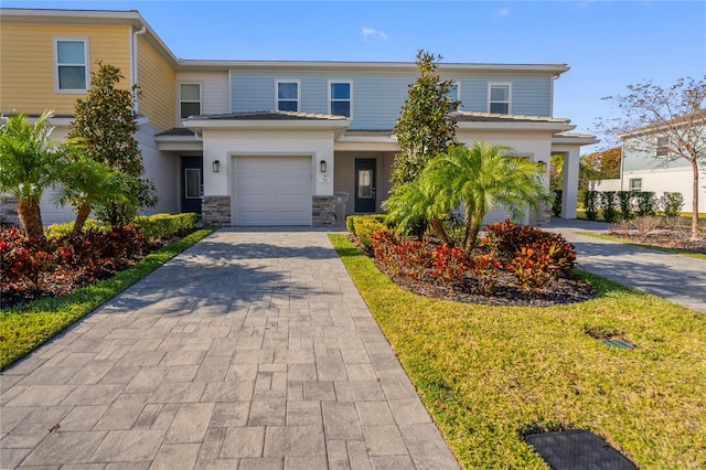 view of front of home with a garage