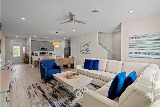 living room featuring ceiling fan