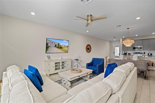 living room featuring ceiling fan