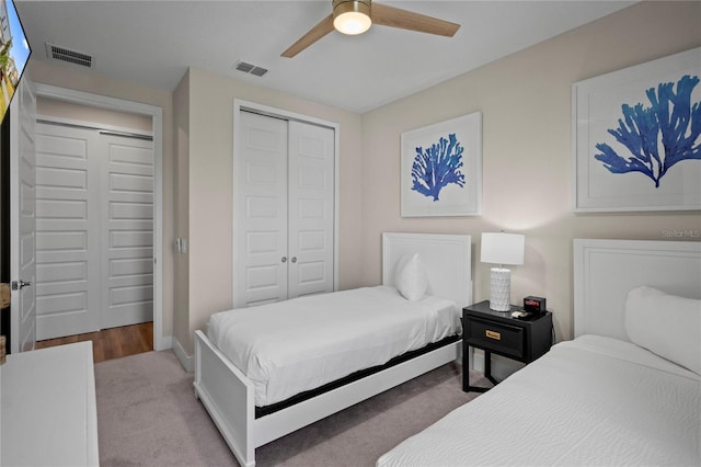 bedroom featuring a closet, ceiling fan, and hardwood / wood-style floors