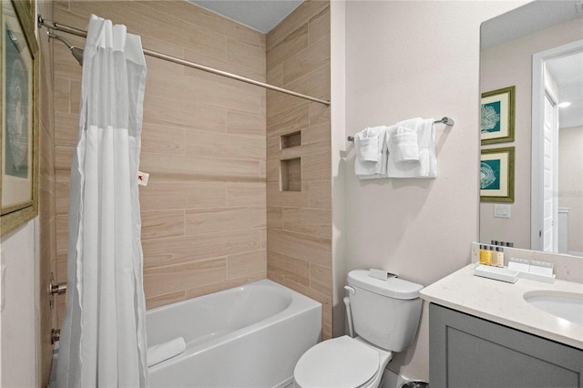 full bathroom with shower / bath combination with curtain, vanity, and toilet