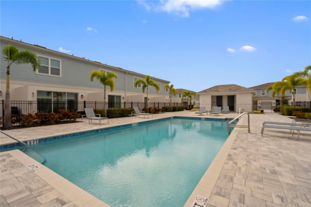 view of pool featuring a patio area