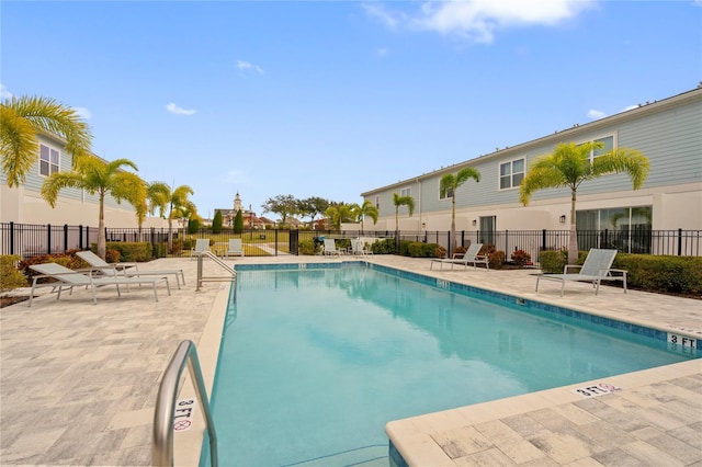 view of pool featuring a patio area