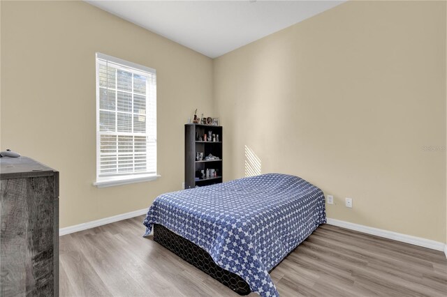 bedroom featuring hardwood / wood-style flooring