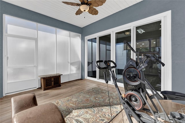 interior space featuring hardwood / wood-style flooring, ceiling fan, and wooden ceiling