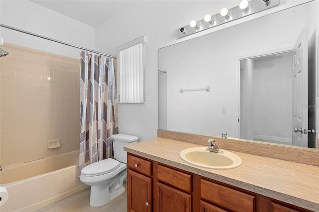 full bathroom featuring vanity, wood-type flooring, shower / tub combo, and toilet