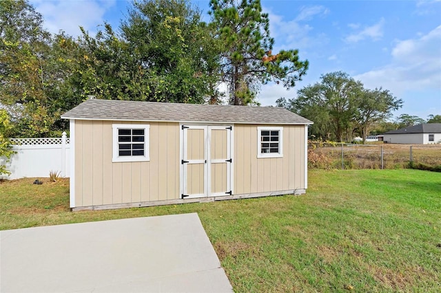 view of outdoor structure featuring a yard