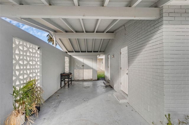 view of patio / terrace with a carport