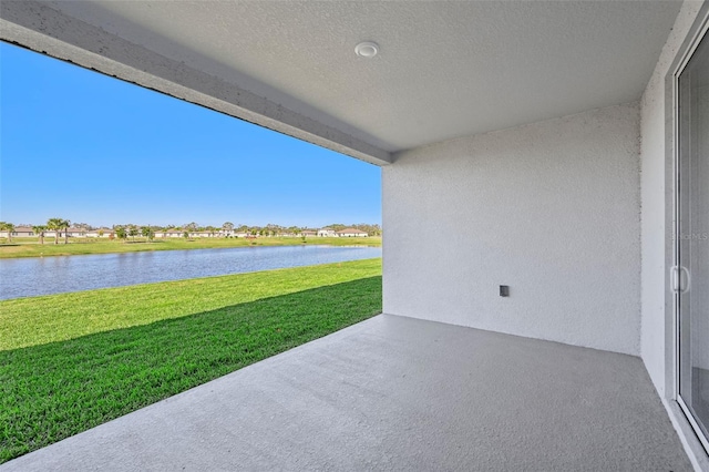 view of patio / terrace featuring a water view