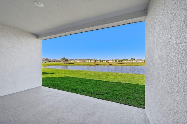 view of patio / terrace with a water view