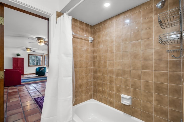 bathroom with ceiling fan, shower / bath combo with shower curtain, and tile patterned flooring