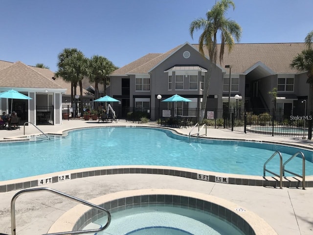 view of swimming pool featuring a patio area