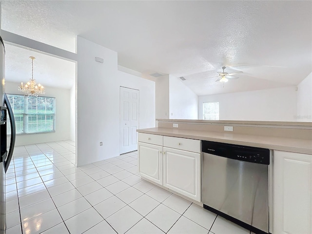 kitchen featuring stainless steel appliances, white cabinetry, pendant lighting, a healthy amount of sunlight, and ceiling fan with notable chandelier