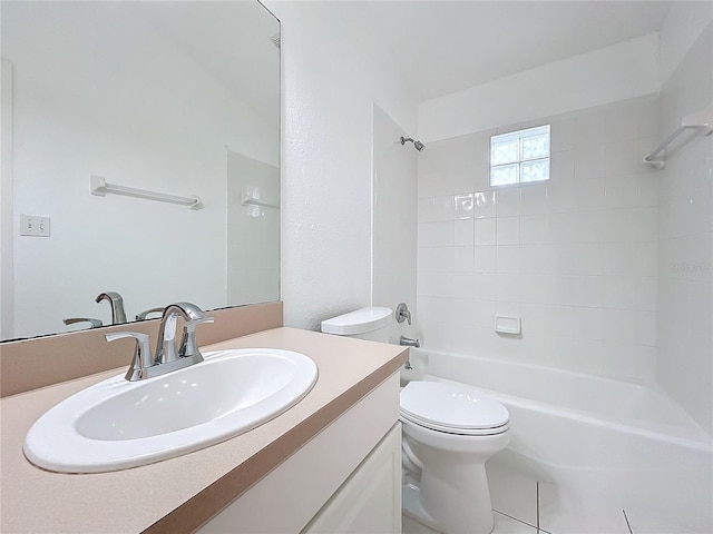 full bathroom with vanity, toilet, and tiled shower / bath