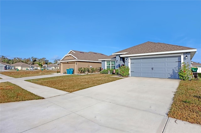 single story home with a garage and a front yard