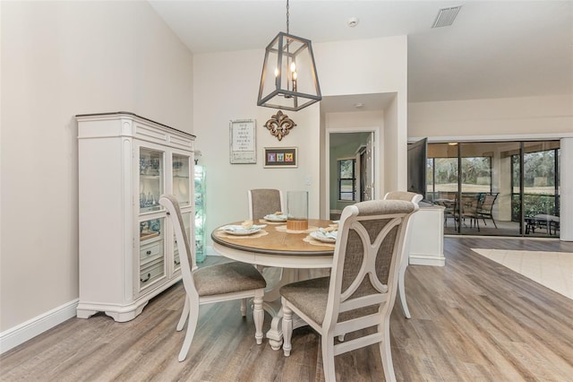 dining room featuring light wood-type flooring