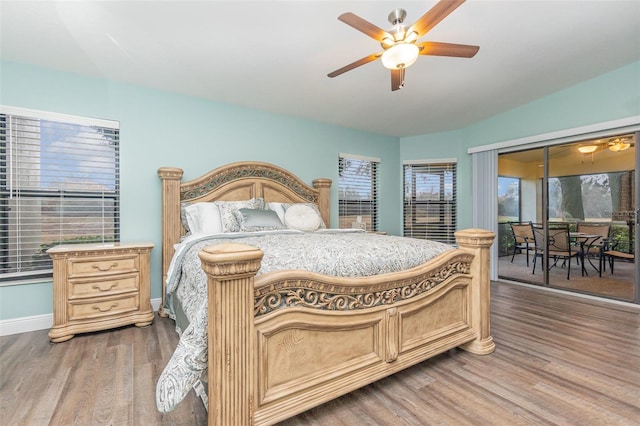 bedroom with ceiling fan and hardwood / wood-style floors