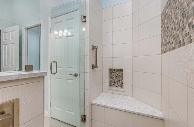 bathroom featuring an enclosed shower