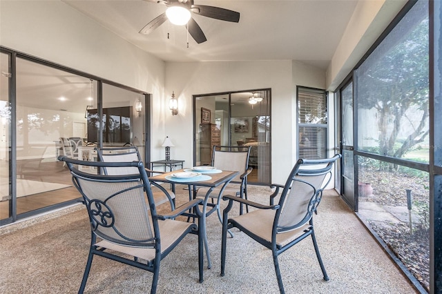 sunroom with ceiling fan