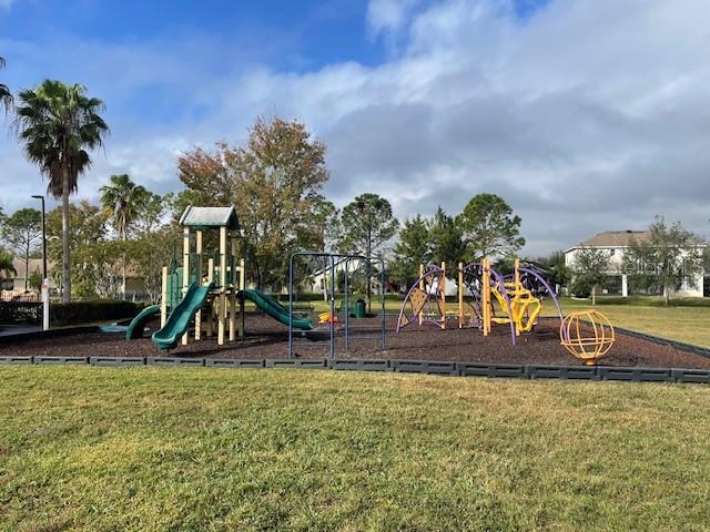 view of jungle gym featuring a yard