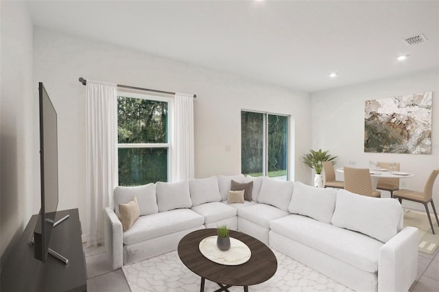 living room featuring light tile patterned flooring