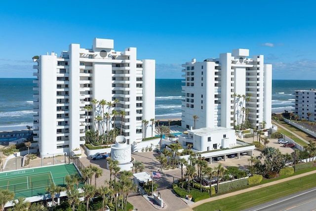 view of building exterior featuring a water view