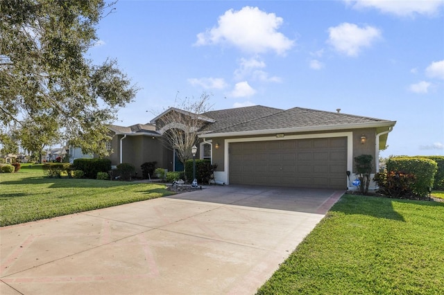 ranch-style home with a garage and a front lawn