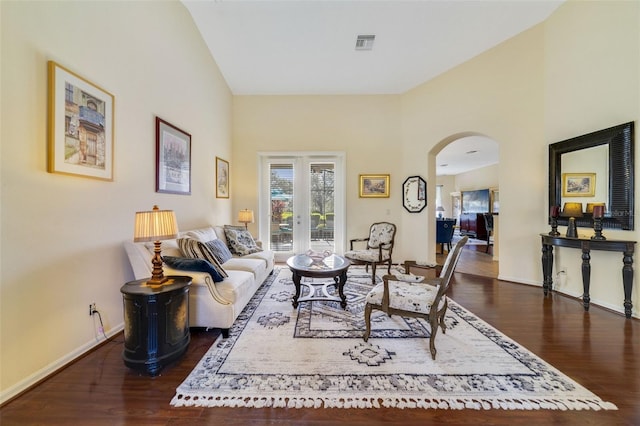 living room with dark hardwood / wood-style floors