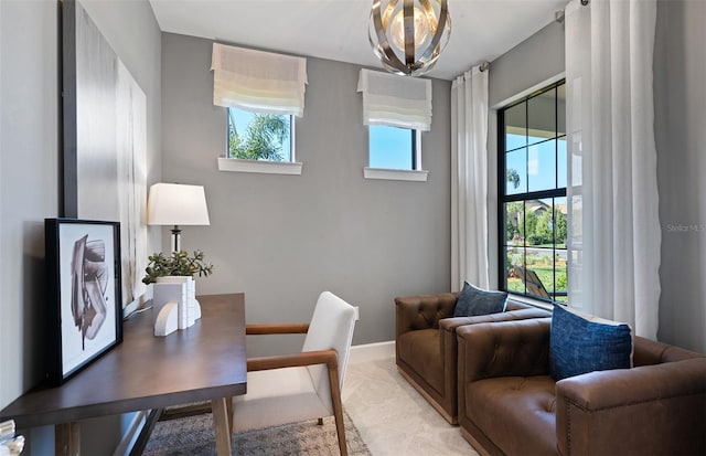 home office with a chandelier