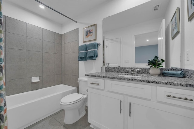 full bathroom with shower / tub combo with curtain, tile patterned floors, toilet, and vanity