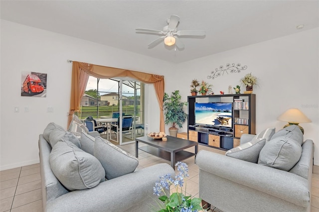 tiled living room featuring ceiling fan