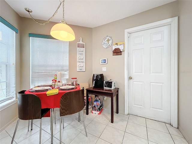 view of tiled dining space