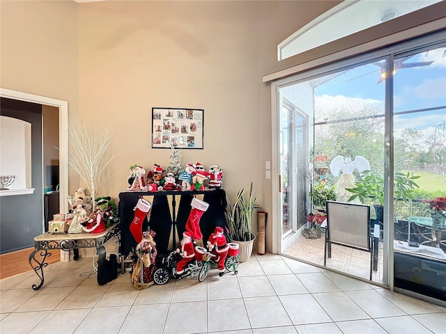 doorway to outside featuring light tile patterned floors