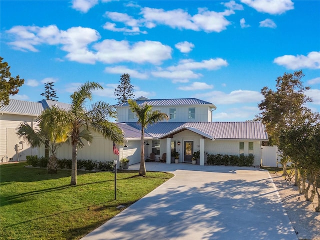 view of front of home with a front lawn